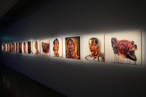 Artworks of Prison Life painted by Myuran Sukumaran, one of the Bali Nine, at an exhibition in Sydney in 2017 (Matt Blyth/Getty Images)