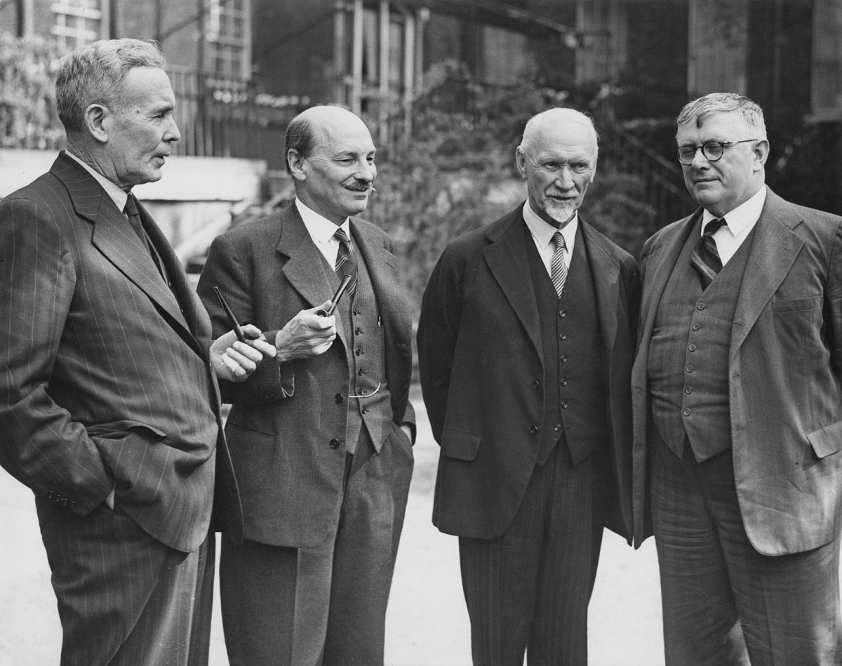 From left to right, Australian Prime Minister Ben Chifley (1885 - 1951), British Prime Minister Clement Attlee (1883 - 1967), South African Prime Minister Jan Christiaan Smuts (1870 - 1950) and Australian Foreign Minister H. V. Evatt (1894 - 1965) in the garden of 10 Downing Street in London, during Empire talks, 1946. (Photo by Central Press/Hulton Archive/Getty Images)