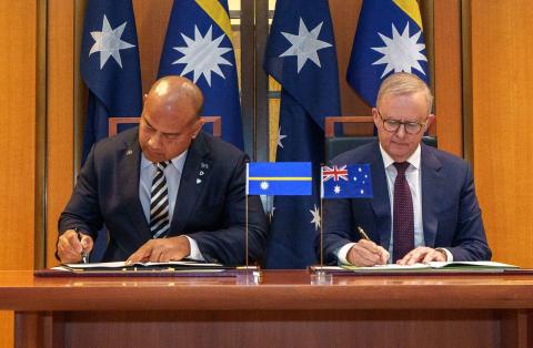Nauru President David Adeang and Australian Prime Minister Anthony Albanese sign the Nauru-Australia Treaty on 9 December 2024 (@AlboMP/X)