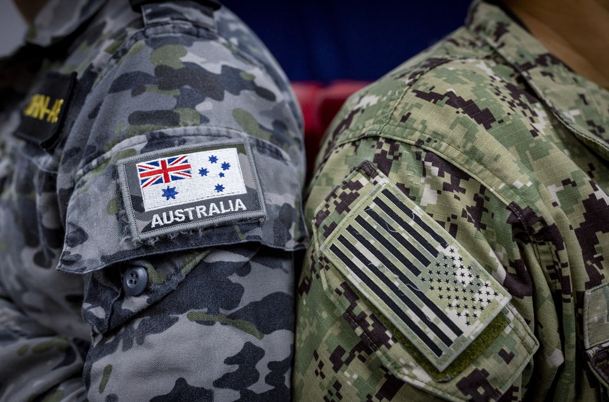 Title: Exercise CYBER SENTINELS 2023 Keywords: Tri-ServiceTraining ActivityS20240039S20233033Foreign Defence ForcesExercise Cyber Sentinels 2023S20240038 Photographer: LSIS Nadav Harel Related Imagery: S20233012 Caption: Australian Navy ensign and United States Navy ensign, side by side during Exercise Cyber Sentinels 23. Mid Caption: Exercise Cyber Sentinels is an annual cyber exercise which was held 2 – 13 October 2023 in Canberra. This was the first time this exercise was planned and held at the SECRET//REL Five Eyes level in Australia by the ADF, with previous exercises held by our global partners at a lower classification level.